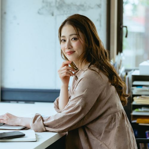 一般事務からWEBデザイナーへ転身した田中ゆきのさんのポートレート